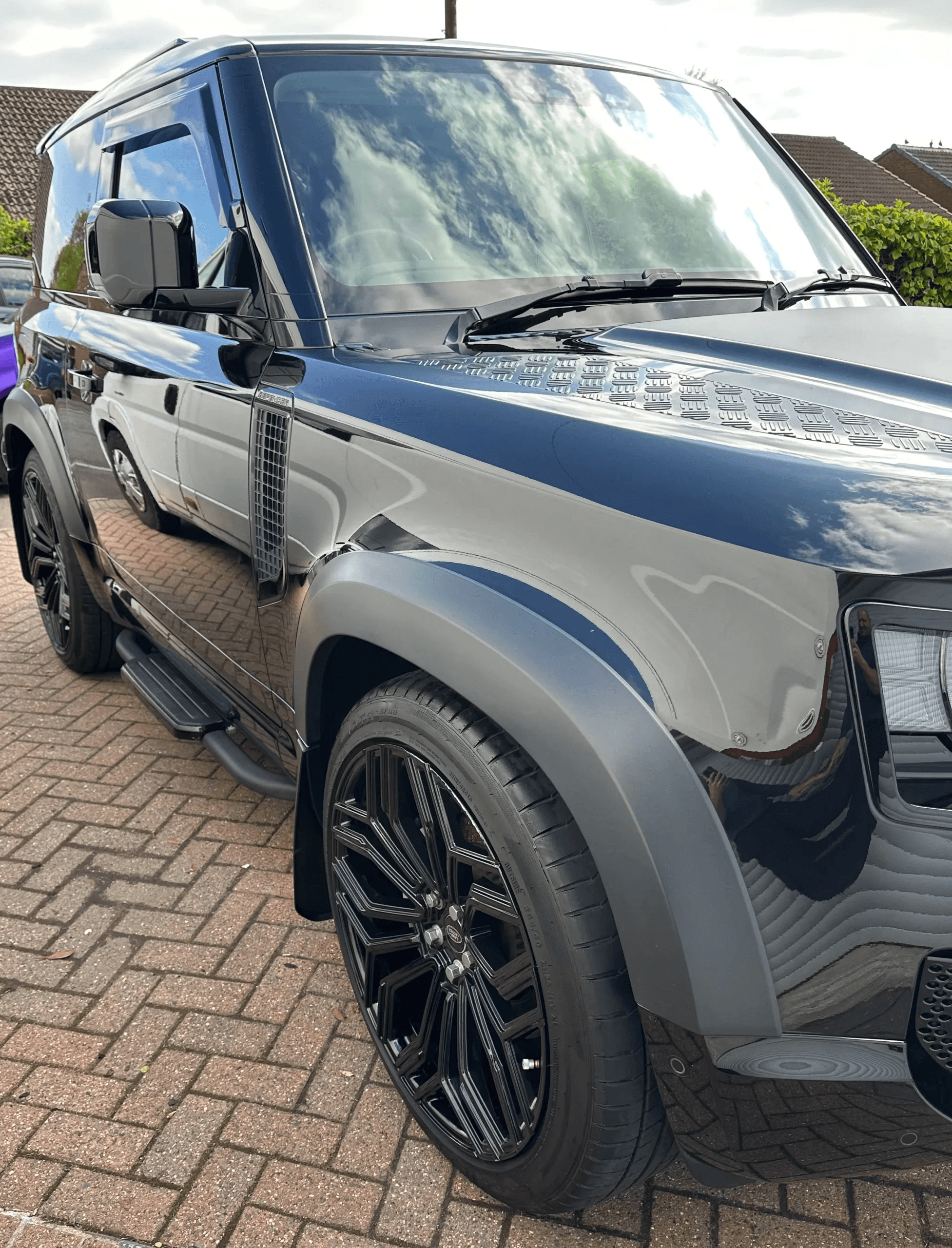 New car freshly detailed and ceramic-protected on a Manchester driveway